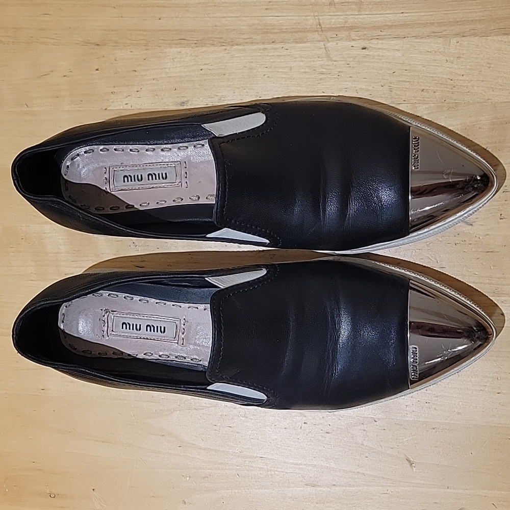 Miu Miu Black Leather Loaffers with Silver Cap Toe